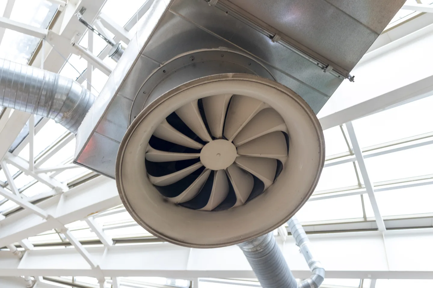Industrial ventilation fan installed in a duct system